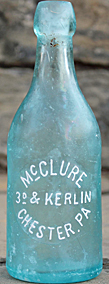 McCLURE WEISS BEER EMBOSSED BEER BOTTLE