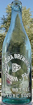 DONORA BREWING COMPANY EMBOSSED BEER BOTTLE