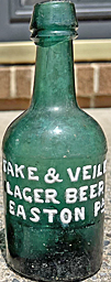 TAKE & VEILE LAGER BEER EMBOSSED BEER BOTTLE