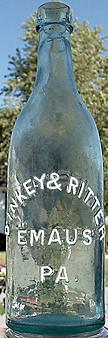 DINKEY & RITTER CENTENNIAL LAGER BEER EMBOSSED BEER BOTTLE