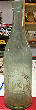 AMERICAN BREWERY EMBOSSED BEER BOTTLE