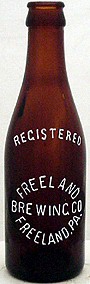 FREELAND BREWING COMPANY EMBOSSED BEER BOTTLE