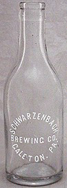 SCHWARZENBACH BREWING COMPANY EMBOSSED BEER BOTTLE