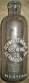 SCHWARZENBACH BREWING COMPANY EMBOSSED BEER BOTTLE