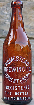 HOMESTEAD BREWING COMPANY EMBOSSED BEER BOTTLE