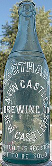 NEW CASTLE BREWING COMPANY EMBOSSED BEER BOTTLE