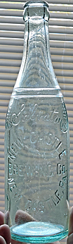 NEW CASTLE BREWING COMPANY EMBOSSED BEER BOTTLE