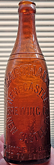 NEW CASTLE BREWING COMPANY EMBOSSED BEER BOTTLE