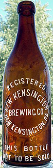 NEW KENSINGTON BREWING COMPANY EMBOSSED BEER BOTTLE