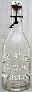 C. W. QUEEN WEISS BEER EMBOSSED BEER BOTTLE