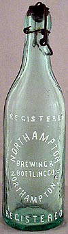 NORTHAMPTON BREWING & BOTTLING COMPANY EMBOSSED BEER BOTTLE