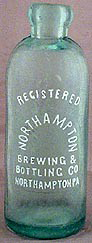 NORTHAMPTON BREWING & BOTTLING COMPANY EMBOSSED BEER BOTTLE