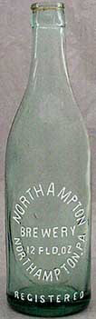 NORTHAMPTON BREWERY EMBOSSED BEER BOTTLE