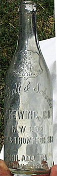 ARNHOLT & SCHAEFER BREWING COMPANY EMBOSSED BEER BOTTLE