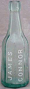 JAMES CONNOR WEISS BEER EMBOSSED BEER BOTTLE