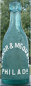 CONNOR & McQUAIDE WEISS BEER EMBOSSED BEER BOTTLE