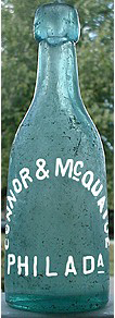 CONNOR & McQUAIDE WEISS BEER EMBOSSED BEER BOTTLE