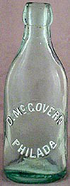 D. McGOVERN WEISS BEER EMBOSSED BEER BOTTLE