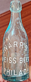 JOHN NARR'S WEISS BEER EMBOSSED BEER BOTTLE