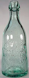 GEORGE WILLIAM OTTO WEISS BEER EMBOSSED BEER BOTTLE