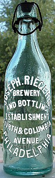 JOSEPH RIEGERS BREWERY AND BOTTLING ESTABLISHMENT EMBOSSED BEER BOTTLE