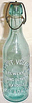 AUGUST VOLLMER BREWERY & BOTTLING DEPARTMENT EMBOSSED BEER BOTTLE