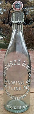 WEISBROD & HESS BREWING COMPANY BOTTLING DEPARTMENT EMBOSSED BEER BOTTLE