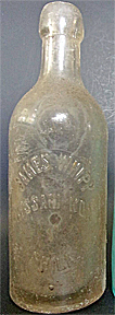 JAMES WHIPP WEISS BIER EMBOSSED BEER BOTTLE