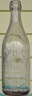 FREDERICK WOLF BREWERY EMBOSSED BEER BOTTLE