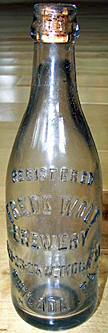 FREDERICK WOLF BREWERY EMBOSSED BEER BOTTLE