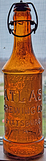 ATLAS BREWING COMPANY EMBOSSED BEER BOTTLE