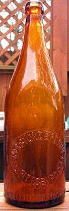 KEYSTONE BREWING COMPANY EMBOSSED BEER BOTTLE