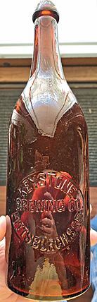 KEYSTONE BREWING COMPANY EMBOSSED BEER BOTTLE