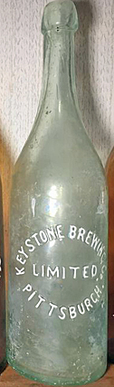 KEYSTONE BREWING COMPANY EMBOSSED BEER BOTTLE