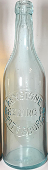 KEYSTONE BREWING COMPANY EMBOSSED BEER BOTTLE