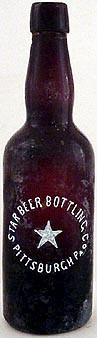 STAR BEER BOTTLING COMPANY EMBOSSED BEER BOTTLE