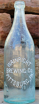 WAINWRIGHT BREWING COMPANY EMBOSSED BEER BOTTLE