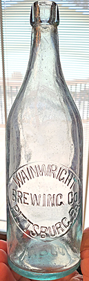 WAINWRIGHT BREWING COMPANY EMBOSSED BEER BOTTLE