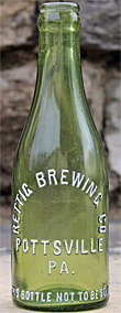 RETTIG BREWING COMPANY EMBOSSED BEER BOTTLE