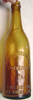 RETTIG BREWING COMPANY EMBOSSED BEER BOTTLE