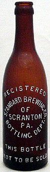 STANDARD BREWING COMPANY EMBOSSED BEER BOTTLE