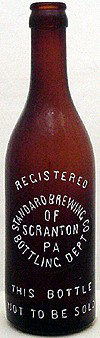 STANDARD BREWING COMPANY EMBOSSED BEER BOTTLE