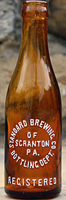 STANDARD BREWING COMPANY EMBOSSED BEER BOTTLE