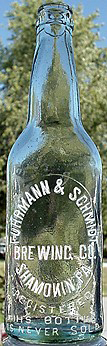 FUHRMANN & SCHMIDT BREWING COMPANY EMBOSSED BEER BOTTLE