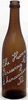 THE HOME BREWING COMPANY EMBOSSED BEER BOTTLE