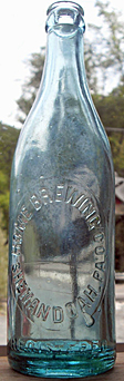 THE HOME BREWING COMPANY EMBOSSED BEER BOTTLE