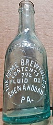 THE HOME BREWING COMPANY EMBOSSED BEER BOTTLE