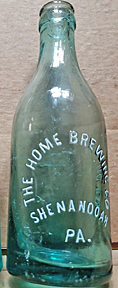 THE HOME BREWING COMPANY EMBOSSED BEER BOTTLE