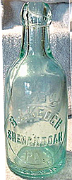 B. J. KEOGH WEISS BEER EMBOSSED BEER BOTTLE