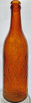 IMPERIAL BEER COMPANY EMBOSSED BEER BOTTLE